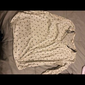 White patterned V-neck top